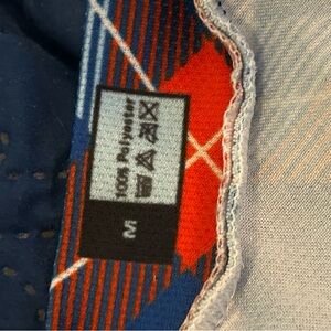 Blue and Red Patterned Garment